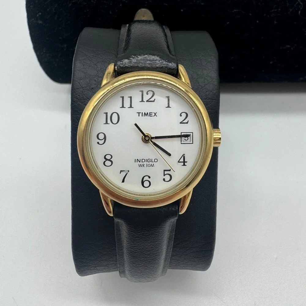 Timex Indiglo WR 30M Gold Tone White Dial Black Leather Watch CR 1216 needs bat